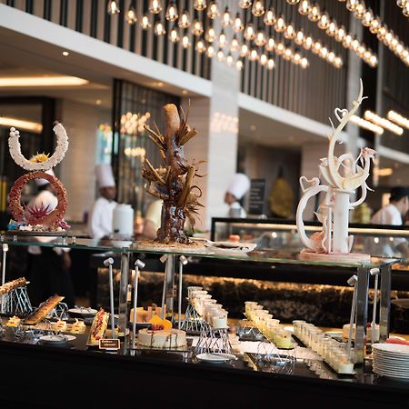 Pullman Dubai Downtown Hotel Exterior photo A buffet at a hotel